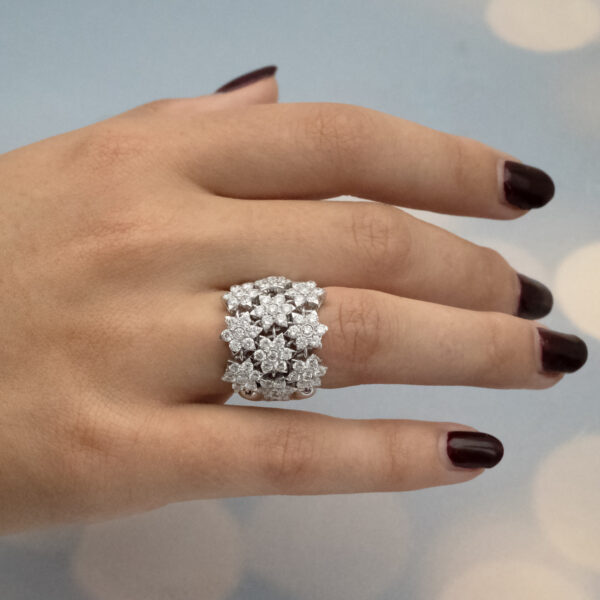 45diamond-floral-mesh-ring-claris-a.jpg24 Diamond floral mesh ring in 18K white gold with individually mounted diamond flowers and heart-shaped cut-outs by Claris-A.