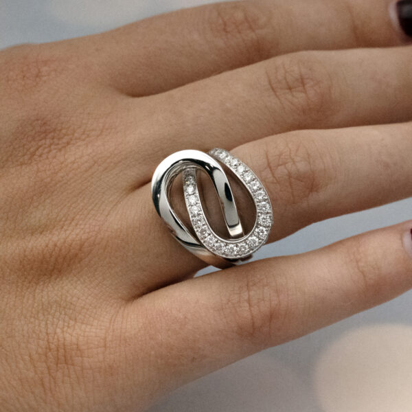 4542 Interwoven diamond loop ring in 18K white gold with one polished band and one pavé-set with brilliant-cut diamonds by Claris-A.
