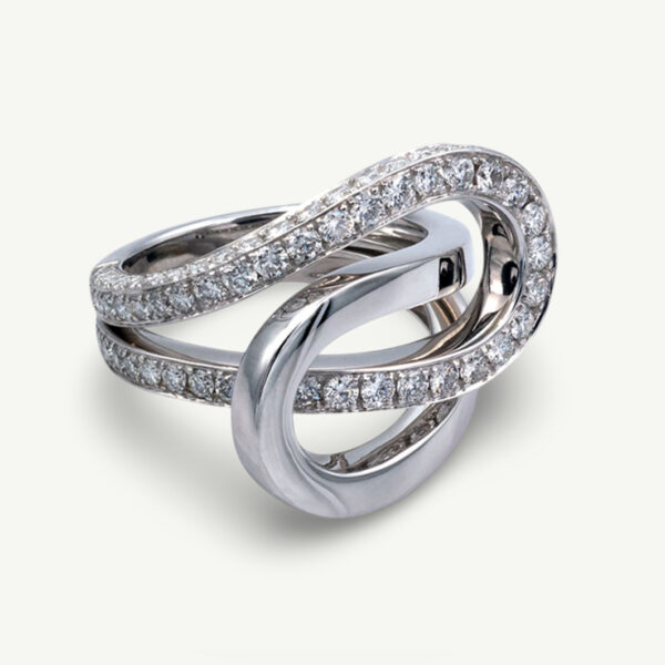 interwoven-diamond-loop-ring-claris-a.jpg Interwoven diamond loop ring in 18K white gold with one polished band and one pavé-set with brilliant-cut diamonds by Claris-A.