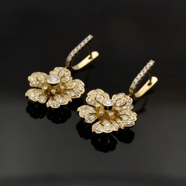 diamond-18Kgold-earrings-claris-a.jpg Diamond floral earrings in 18K yellow gold with softly curved petals, a central diamond, and diamond-set hoops by Claris-A.