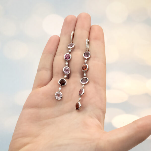 spinels-diamonds-earrings-18k-white-gold.jpg Spinels and Diamonds Earrings in 18K White Gold, six spinels, 0.35 ct diamonds, fluid vertical design.