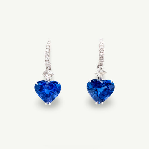 Cover_Sapphire_WhiteGold_Earrings Ceylon sapphire and diamond earrings in 18K white gold with heart-shaped sapphires totaling 9.75 carats and pavé diamond hoops by Claris-A.