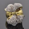 diamond-bow-ring-claris-a.jpg Diamond bow ring in 18K yellow gold pavé-set with brilliant-cut diamonds across sculpted ribbons by Claris-A.