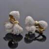 diamond-ribbon-earrings-claris-a.jpg Diamond ribbon earrings in 18K yellow gold shaped as sculpted bows pavé-set with brilliant-cut diamonds by Claris-A.