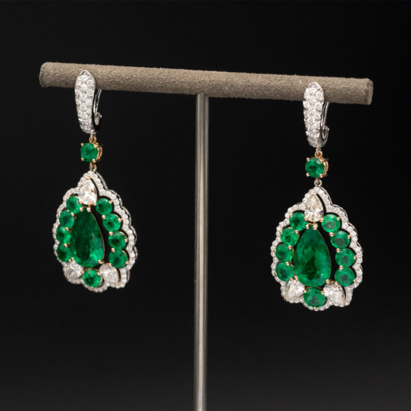 muzo-green-colombian-emerald-diamond-earrings-white-gold.jpg Muzo green Colombian emerald diamond earrings in 18K white gold with pear-shaped emeralds framed by emeralds and diamonds