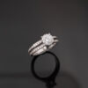 6014 18K white gold ring with a round brilliant diamond and diamond-set split shoulders