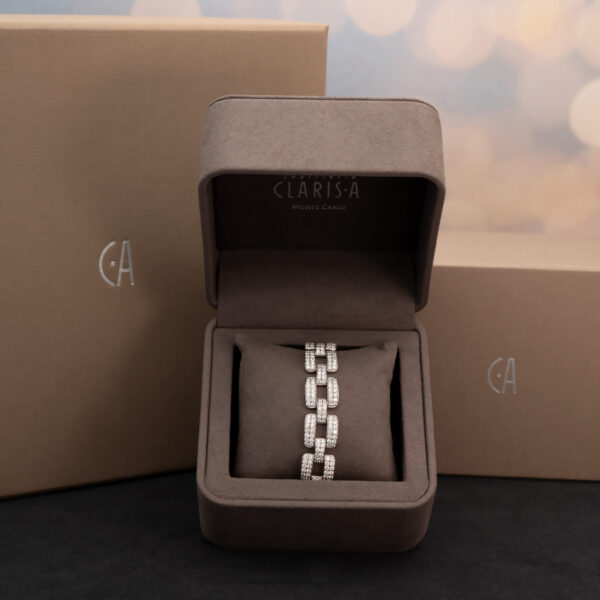 Diamond Panel Bracelet in 18K White Gold Articulated 18K white gold bracelet composed of rectangular diamond-set links with open centres and a graphic, structured design.