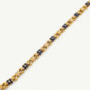 Cover_Website_BraceletClarisA_Sapphire Articulated 18K yellow gold bracelet with rounded links and raised floral motifs set with sapphires and diamonds in a fluid design.