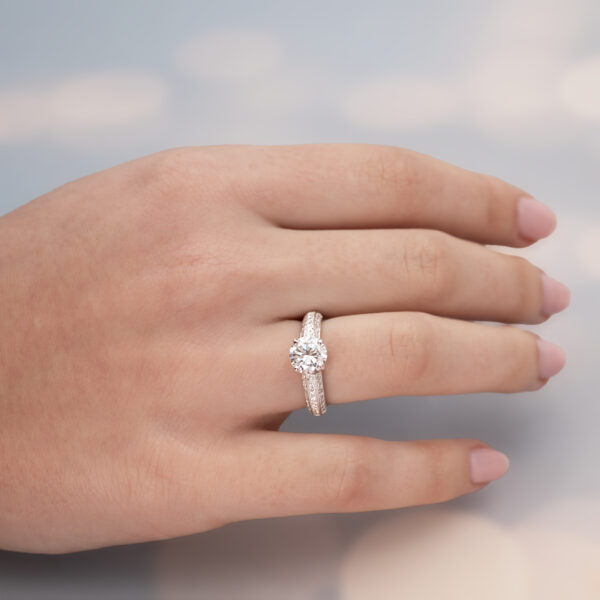 5909C 18K white gold diamond engagement ring with 1.50ct round brilliant centre stone worn on hand