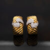 Ribbed Barrel Earrings – Diamond & Yellow Gold Gold Wide ribbed yellow and white gold earrings with diamond-set teardrop motifs