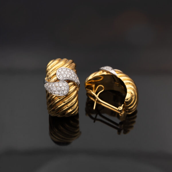 Wide ribbed yellow and white gold earrings with diamond-set teardrop motifs