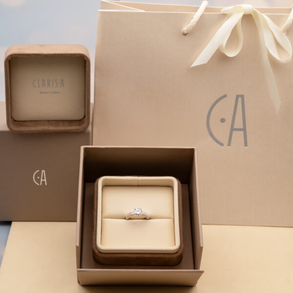 6238 18K white gold diamond engagement ring with a 1.50ct round brilliant centre stone in a four-prong setting and pavé-set diamond