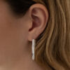 Diamond Oval Hoop Earrings White Gold White gold oval hoop earrings with brilliant-cut diamonds in a single row