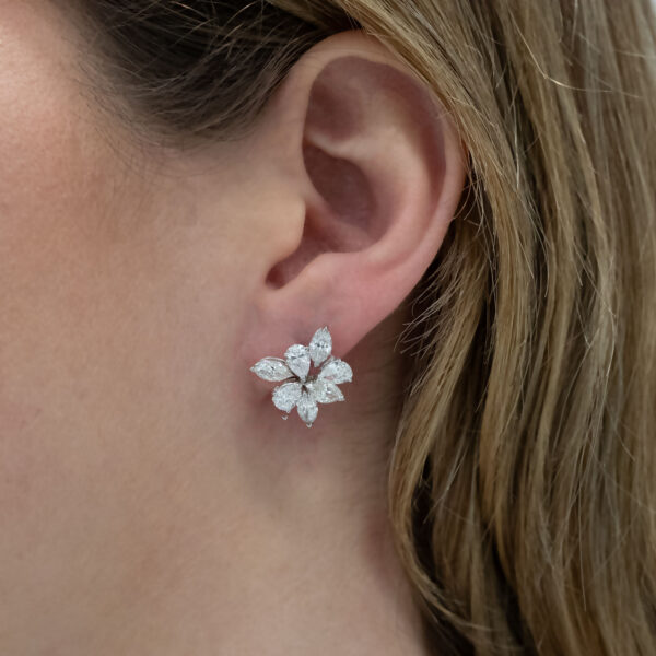 diamond-clarisA-studs-detachable-earrings Claris-A diamond flower studs on ear.
