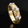 6663 Wide ribbed yellow and white gold bracelet with diamond-set teardrop motifs