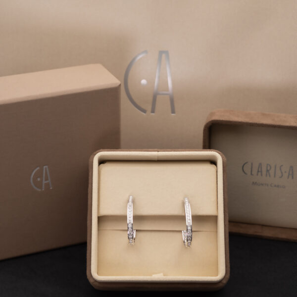 Diamond Oval Hoop Earrings White Gold White gold oval hoop earrings with brilliant-cut diamonds in a single row