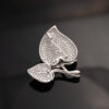 diamond-leaf-brooch-back-honeycomb Diamond pavé leaf heart pendant in white gold with tsavorites