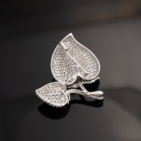 diamond-leaf-brooch-back-honeycomb Diamond pavé leaf heart pendant in white gold with tsavorites