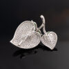diamond-leaf-brooch-back-honeycomb Back of white gold diamond leaf pendant with openwork structure