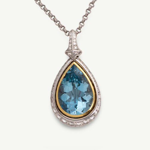 Cover_Aquamarine_ClarisA White and yellow gold pendant with pear-shaped aquamarine and diamond halo