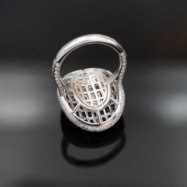 Sapphire Diamond Illusion Cluster Ring 18K white gold ring with illusion-set diamond cluster centre surrounded by baguette sapphires and pavé diamonds