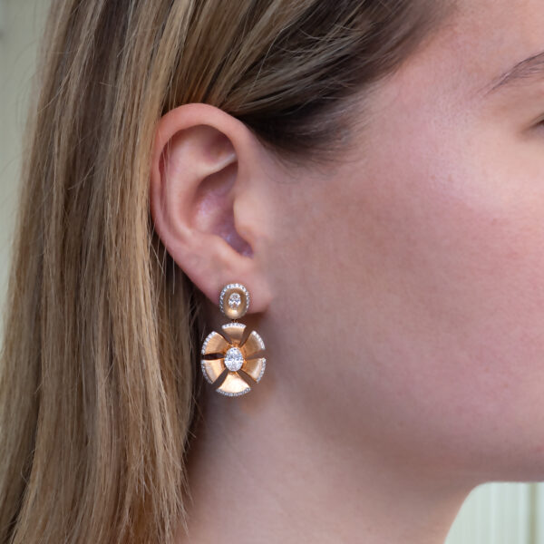 Rose Gold Diamond Petal Burst Earrings 18K rose gold dangle earrings with oval diamonds and pavé-set petal-shaped drop design