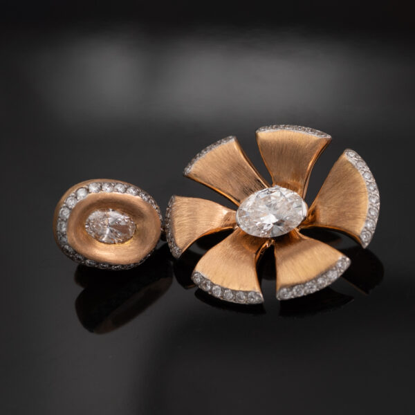 Rose Gold Diamond Petal Burst Earrings 18K rose gold dangle earrings with oval diamonds and pavé-set petal-shaped drop design