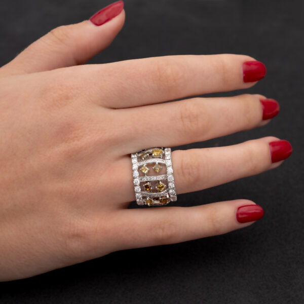 Color Rhythm Diamond Band – Architectural Fancy Diamond Ring Wide 18K white gold ring with structured diamond-set bars and rows of white and fancy colored diamonds around the band