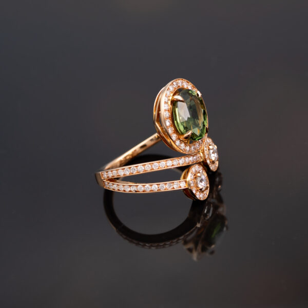 RoseGold_Diamond_Sapphire_ring 18K rose gold openwork ring with oval green sapphire and diamond halo, sculptural asymmetrical wrap design