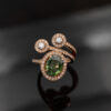 RoseGold_Diamond_Sapphire_ring 18K rose gold openwork ring with oval green sapphire and diamond halo, sculptural asymmetrical wrap design