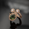 Details_ClarisA_Diamond_RoseGoldRing 18K rose gold openwork ring with oval green sapphire and diamond halo, sculptural asymmetrical wrap design