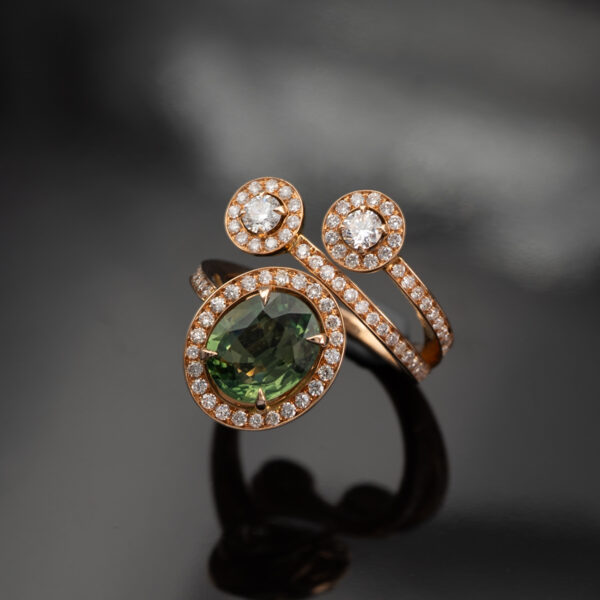 Details_ClarisA_Diamond_RoseGoldRing 18K rose gold openwork ring with oval green sapphire and diamond halo, sculptural asymmetrical wrap design