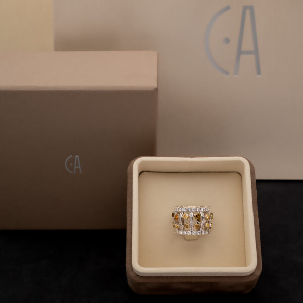 Color Rhythm Diamond Band – Architectural Fancy Diamond Ring Wide 18K white gold ring with structured diamond-set bars and rows of white and fancy colored diamonds around the band