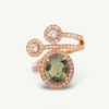 Cover_ClarisA_Orbit_Sapphire_RIng 18K rose gold openwork ring with oval green sapphire and diamond halo, sculptural asymmetrical wrap design