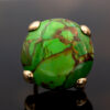 Apple Green Turquoise Dome Ring in Yellow Gol Domed apple green turquoise cabochon ring set in yellow gold with sculptural prongs and organic veining
