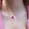 Pink Rubellite Drop Necklace Pear-shaped rubellite and pink sapphire pendant necklace in 18K rose gold with articulated chain.