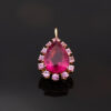 Pink Rubellite Drop Necklace Pear-shaped rubellite and pink sapphire pendant necklace in 18K rose gold with articulated chain.
