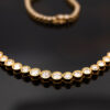 Milgrain Diamond Tennis Necklace Yellow Gold 18k yellow gold tennis necklace with graduated round diamonds in a milgrain setting.