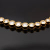 Milgrain Diamond Tennis Necklace Yellow Gold 18k yellow gold tennis necklace with graduated round diamonds in a milgrain setting.
