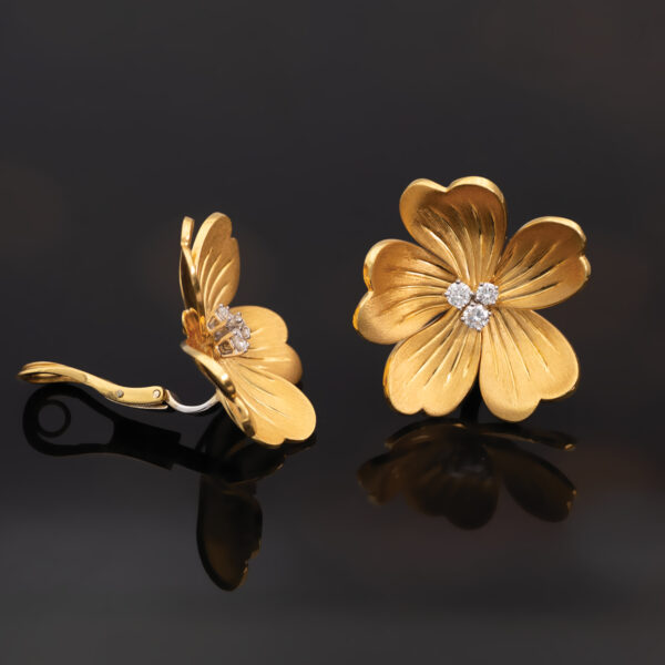 Italian Diamond Flower Earrings in 18K Yellow Gold Italian five-petal diamond flower earrings in textured 18K yellow gold with round brilliant-cut diamond centers by Claris-A.