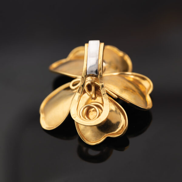 Italian Diamond Flower Earrings in 18K Yellow Gold Italian five-petal diamond flower earrings in textured 18K yellow gold with round brilliant-cut diamond centers by Claris-A.
