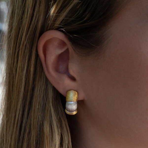 Italian Dual-Tone Gold Sculptural Earrings Italian 18K white and yellow gold sculptural earrings with handmade engraved textured links and rounded gold details.