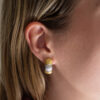 Italian Dual-Tone Gold Sculptural Earrings Italian 18K white and yellow gold sculptural earrings with handmade engraved textured links and rounded gold details.