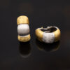 Italian Dual-Tone Gold Sculptural Earrings Italian 18K white and yellow gold sculptural earrings with handmade engraved textured links and rounded gold details.