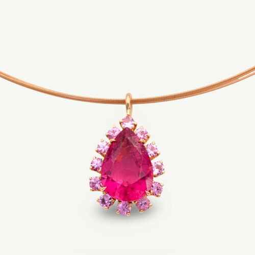 Pink Rubellite Drop Necklace Pear-shaped rubellite and pink sapphire pendant necklace in 18K rose gold with articulated chain.