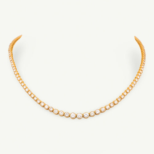 Milgrain Diamond Tennis Necklace Yellow Gold 18k yellow gold tennis necklace with graduated round diamonds in a milgrain setting.
