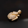 Diamond Scarab Pendant in 18K Yellow Gold Sculptural 18K yellow gold scarab pendant set with diamonds, featuring a domed beetle design with geometric detailing and high-jewelry finish.