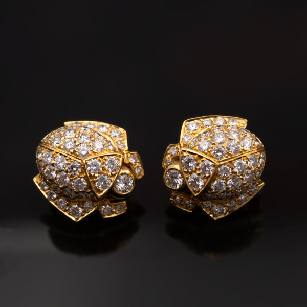 Diamond Scarab Earrings in 18K Yellow Gold Sculptural 18K yellow gold scarab earrings set with diamonds, featuring a domed beetle design with geometric detailing and high-jewelry finish.