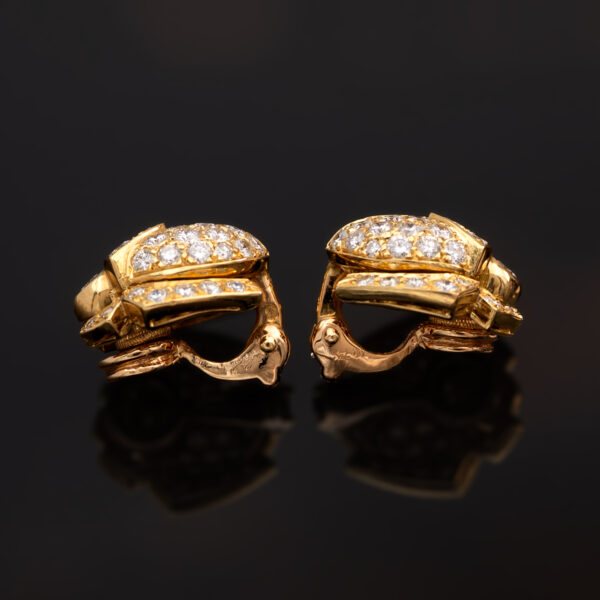 Diamond Scarab Earrings in 18K Yellow Gold Sculptural 18K yellow gold scarab earrings set with diamonds, featuring a domed beetle design with geometric detailing and high-jewelry finish.