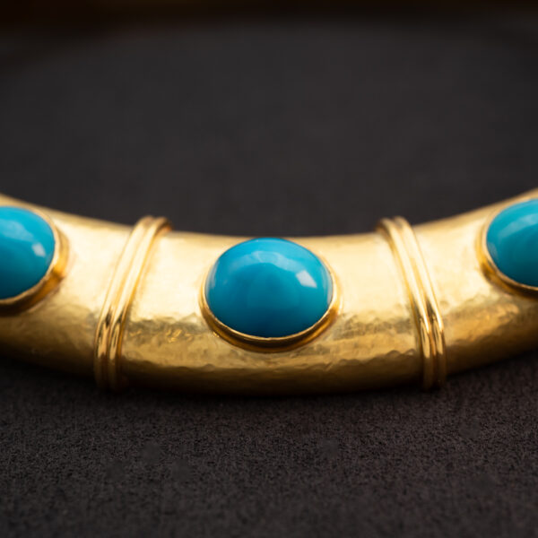 Persian Blue Turquoise Collar Necklace in 18K Yellow Gold Hand-hammered 18K yellow gold collar necklace set with natural Persian-blue turquoise cabochons and concealed closure.
